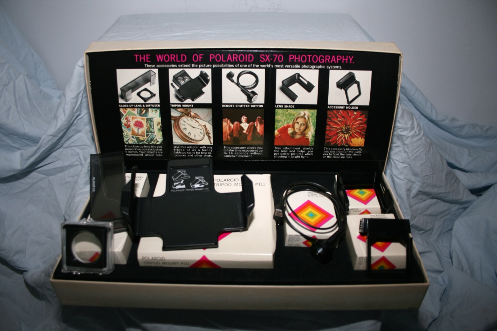 Polaroid SX-70 instant camera with accessory kit